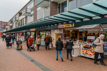 People at shopping street at Dronten, Flevoland, The Netherlands February 4th 2017のeditorial素材
