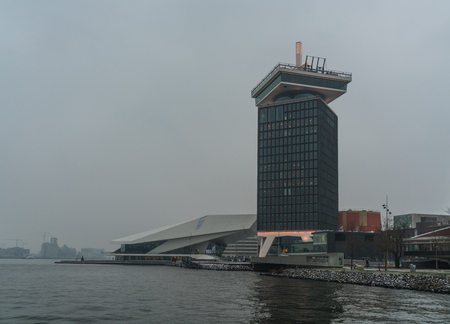 Eye museum and Amsterdam Tower viewed from lake IJ, Amsterdam, The Netherlands, February 10th 2017のeditorial素材
