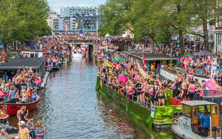 Amsterdam, August 5 2017: Boats of the 2017 Canal parade sailing over the canals of the Prinsengracht in the center of Amsterdamのeditorial素材