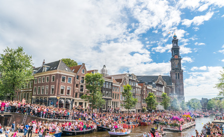 Amsterdam, August 5 2017: Boats of the 2017 Canal parade sailing over the canals of the Prinsengracht in the center of Amsterdamのeditorial素材