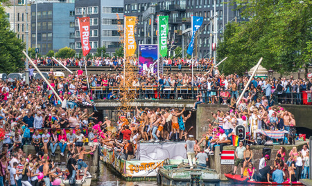 Amsterdam, August 5 2017: Boats of the 2017 Canal parade sailing over the canals of the Prinsengracht in the center of Amsterdamのeditorial素材