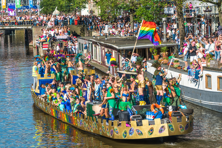 Amsterdam, August 5 2017: Boats of the 2017 Canal parade sailing over the canals of the Prinsengracht in the center of Amsterdamのeditorial素材