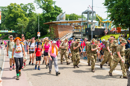 Nijmegen July 19 2017: 4Day Walking tournament contestants passing the center of Nijmegenのeditorial素材