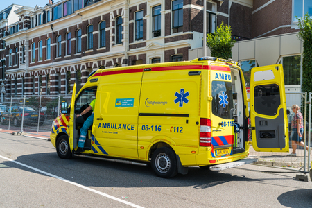 Nijmegen July 21 2017: Ambulance medical vehicle waiting in alley during the 4Day walking tournamentのeditorial素材