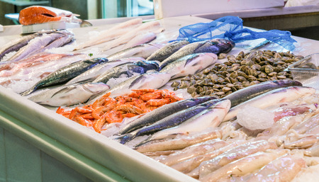 Fresh fish displayed at stall on local marketのeditorial素材
