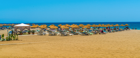 Benalmadena, Spain, june 27, 2017: Tourists lying on the Benalmadena beach near Malagaのeditorial素材