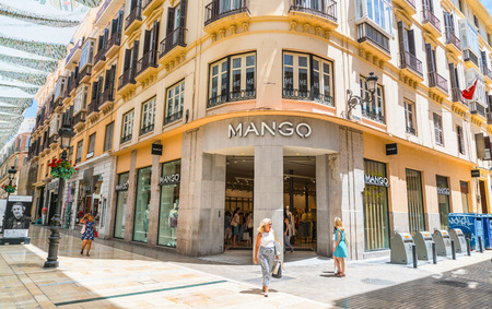 Malaga, Spain, June 27, 2017: Tourists and locals shopping at the Calle Marqués de Lariosのeditorial素材