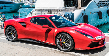 Puerto Banus, Spain, June 28 2017: red ferrari in the harbourのeditorial素材