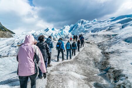 Tourists walking on the Perito Moreno Glacier in the national Glacier park near Calafate in Argentinaのeditorial素材