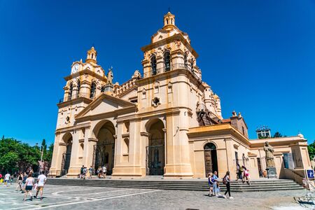 Cordoba, Argentina - February 20th 2019, Locals and tourist passing the Catedral de Cordoba at the Plaza San Martin in the center of townのeditorial素材