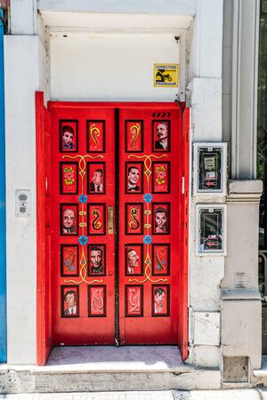 Red door with famous Argentinian peolpe at Recoleta, Buenos Aires, Argentina - January 23th 2019のeditorial素材