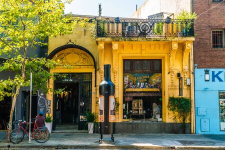 Local sitting on front of a liquor store in Recoleta, Buenos Aires, Argentina - January 23th 2019のeditorial素材