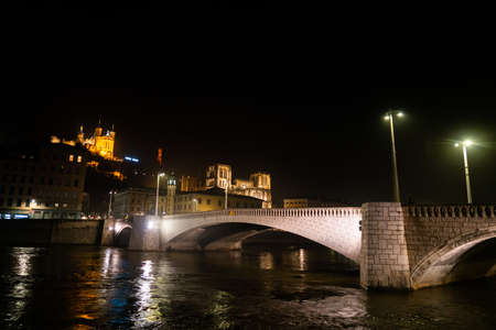 Lyon, France 2nd January 2020 - Pont Bonaparte (Bonaparte bridge) at night connecting the old and new part of Lyon over the Saone riverのeditorial素材