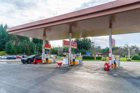 Highway A89, France 2nd January 2020 - commuter getting gas at the Shell Gas station Aire de repos de la Correze (Correze rest area)のeditorial素材