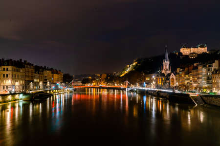 Lyon, France 3rd January 2020 - People crossing the Saone River on the Passarelle St. Georges...
