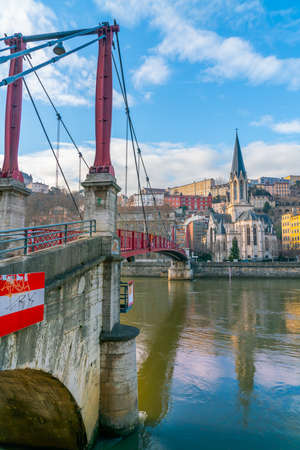Lyon, France 3rd January 2020 - People crossing the Saone River on the Passarelle St. Georges (gangway Saint George) bridgeのeditorial素材