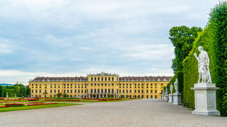 Vienna, Austria - June 25th 2020 - Exterior of the front of Schloss Schonbrunn during Corona time on a sunny day with some tourists visiting the palaceのeditorial素材