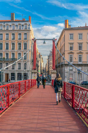 Lyon, France 3rd January 2020 - People crossing the Saone River on the Passarelle St. Georges (gangway Saint George) bridgeのeditorial素材