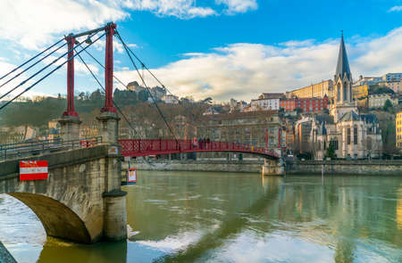 Lyon, France 3rd January 2020 - People crossing the Saone River on the Passarelle St. Georges (gangway Saint George) bridgeのeditorial素材