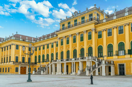 Vienna, Austria - June 25th 2020 - Exterior of the front of Schloss Schonbrunn during Corona time on a sunny day with some tourists visiting the palaceのeditorial素材