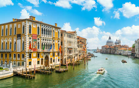 Venice, Italy - June 29th 2020 - The quiet Grand Canal and the Basilica di Santa Maria della Salute seen from the Ponte dell Accademia bridge on a sunny Corona day in summerのeditorial素材