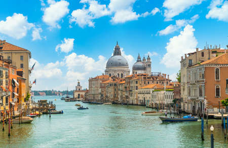 Venice, Italy - June 29th 2020 - The quiet Grand Canal and the Basilica di Santa Maria della Salute seen from the Ponte dell Accademia bridge on a sunny Corona day in summerのeditorial素材
