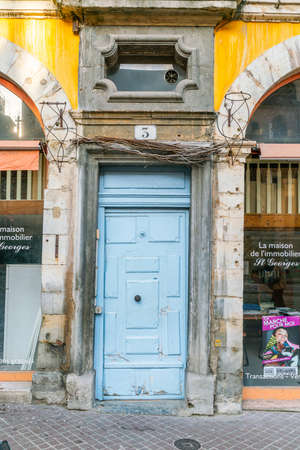 Blue door in old building in Lyonのeditorial素材