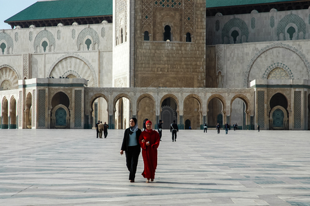 CASABLANCA, MOROCCO - APRIL 26, 2006: Unidentified people by Mosque Hassan II in Casablanca, Morocco. Hassan II Mosque is the largest mosque in Morocco and Africa and the 7th largest in the world.のeditorial素材