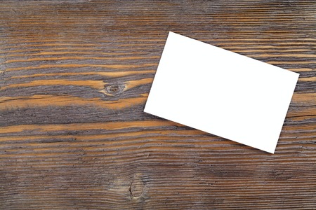 paper over an old wood background. template in rustic styleの写真素材