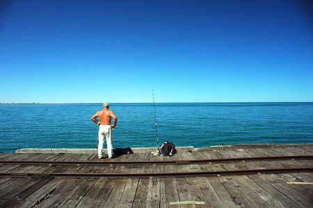 fisherman in carnavorn, western australiaの写真素材
