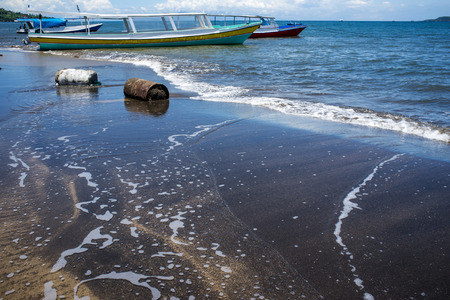 Boats On A Beach, port Mataram, Lombok Island, Indonesiaの写真素材
