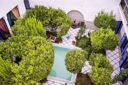 View of the pool and relaxation area in the riad in Marrakech, Morocco 