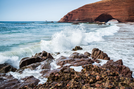 Red arches on atlantic ocean coast, Legzira beach, Sidi Ifni, Morocco, North Africaの写真素材