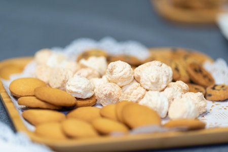 assorted cookies on a wooden plate. close-upの写真素材