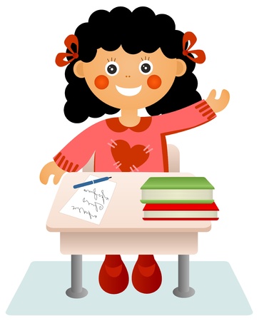 The little girl sits at a school deskの写真素材