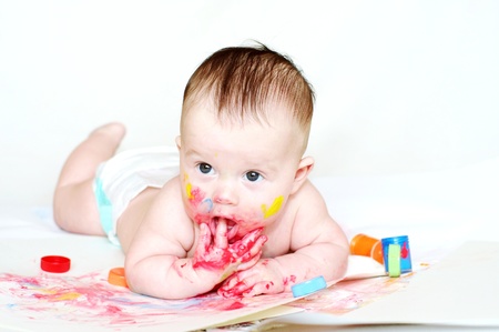 The baby draws finger-type paints  4 months  の写真素材