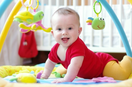 Baby on playmat の写真素材