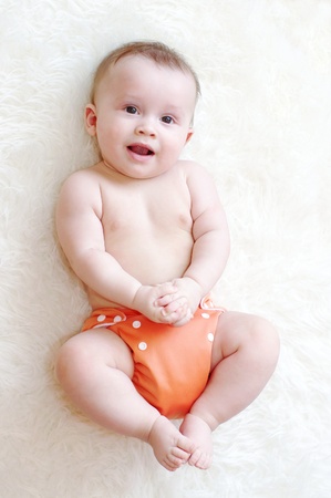 baby in fabric washable diaper の写真素材