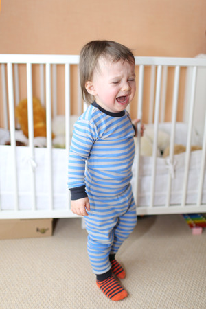 Crying baby don't want go to sleepの写真素材
