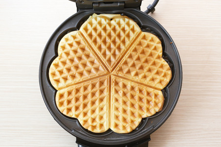 Preparing homemade waffles in the kitchen