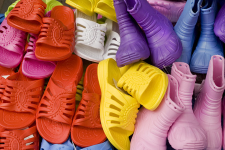 plastic shoes in different colorsの写真素材