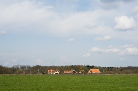 farmhouses in landscape in Hollandの写真素材