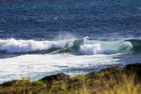 big rolling breakers or waves at the coast