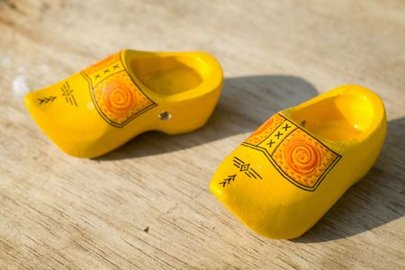 Dutch wooden shoes at the wooden floor