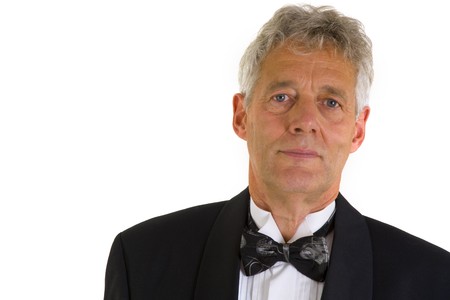Elderly man well dressed in tuxedoの写真素材