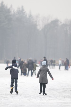 children skating at the iceの写真素材