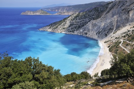 Greek coast with blue water and white beach