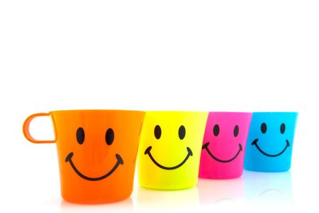 Smiling mugs in cheerful colorsの写真素材