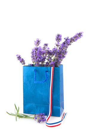 bouquet French lavender flowers in blue paper bagの写真素材