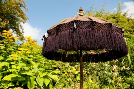oriental parasol for shade in the gardenの写真素材
